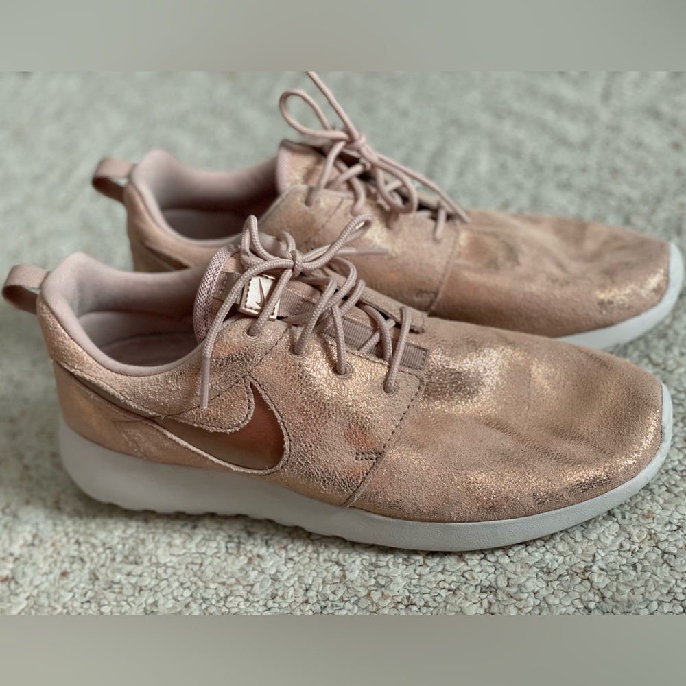 Nike Pink Sneakers with Sleek Design and Suede Finish